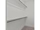 This walk-in closet features carpeted floors, white walls, and wooden racks at 25 Basil Ct, Franklinton, NC 27525