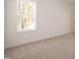 Bright bedroom with a large window that provides natural light and neutral carpeting at 1226 Red Cedar Ct, Youngsville, NC 27596