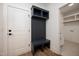 Mudroom with a built in bench and storage at 1226 Red Cedar Ct, Youngsville, NC 27596