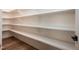 Large pantry with lots of shelving at 1226 Red Cedar Ct, Youngsville, NC 27596