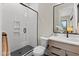 Modern bathroom featuring a glass-enclosed shower and a sleek single-sink vanity at 30 Hartwood Ln, Youngsville, NC 27596