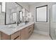 Modern bathroom with double sinks, sleek cabinetry, and contemporary fixtures at 30 Hartwood Ln, Youngsville, NC 27596
