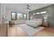 Comfortable bedroom with a large window providing natural light and scenic outdoor views at 30 Hartwood Ln, Youngsville, NC 27596