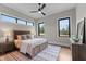 Bright bedroom with a large bed, natural wood accents, and ample natural light at 30 Hartwood Ln, Youngsville, NC 27596