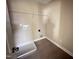 Laundry room with shelving and a utility sink at 48 Silver Ct, Smithfield, NC 27577