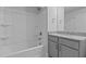 Bathroom featuring a tub-shower combo and vanity with granite counters and soft-close shaker cabinets at 937 Alma Railway Dr # 555, Wake Forest, NC 27587