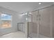 En-suite bathroom offering tiled walk-in shower and vanity with dual sinks at 937 Alma Railway Dr # 555, Wake Forest, NC 27587