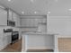 Kitchen with gray cabinets, granite countertops, stainless steel appliances at 937 Alma Railway Dr # 555, Wake Forest, NC 27587