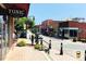 Charming downtown street view with local shops, restaurants, and a lively atmosphere on a sunny day at 937 Alma Railway Dr # 555, Wake Forest, NC 27587