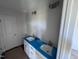Modern bathroom with dual sinks, white cabinets, and stylish lighting fixtures, still under construction at 195 Sawyer Mill Dr, Dunn, NC 28334