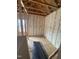 Unfinished bedroom with exposed framing and insulation at 28 Burley Ave, Angier, NC 27501