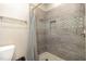 Modern bathroom with stylish tile shower, shower niche and neutral tones at 143 Rawhide Dr, Louisburg, NC 27549