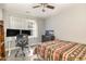 Bedroom featuring a double monitor computer setup and comfortable carpet flooring at 143 Rawhide Dr, Louisburg, NC 27549