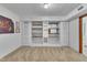 Ample basement storage with built-in shelving and neutral walls at 2600 Wade Ave, Raleigh, NC 27607