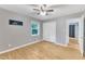 Bright bedroom with hardwood floors and double closets at 2600 Wade Ave, Raleigh, NC 27607