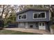 Gray house back with patio, storage shed and large windows at 2600 Wade Ave, Raleigh, NC 27607