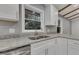 Modern kitchen with stainless steel appliances and granite countertops at 2600 Wade Ave, Raleigh, NC 27607