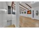 Open living area with hardwood floors and high ceilings at 2600 Wade Ave, Raleigh, NC 27607