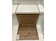 Tan cabinet, white countertop, and light brown flooring selection at 276 White Oak Garden Way # 210, Garner, NC 27529