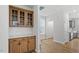 Stylish kitchen area with custom wood cabinets, white subway tile backsplash, and easy access to the dining space at 276 White Oak Garden Way # 210, Garner, NC 27529