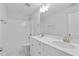 Modern bathroom featuring double vanity with marble countertop, and a shower-tub combination at 604 Spellbrook Rd, Zebulon, NC 27597