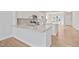 Spacious kitchen with a large island, stainless steel appliances, and ample counter space at 604 Spellbrook Rd, Zebulon, NC 27597