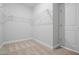 Walk-in closet featuring carpet and wire shelving at 604 Spellbrook Rd, Zebulon, NC 27597