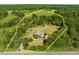 Aerial view of property highlighting the large lot size at 1601 Dairyland Rd, Chapel Hill, NC 27516