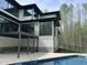 Enjoy this private backyard oasis complete with inground pool and deck at 196 Mountaintop Cir, Pittsboro, NC 27312