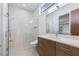 Bright bathroom featuring a tiled shower, sleek vanity, and a modern sink, offering a spa-like experience at 196 Mountaintop Cir, Pittsboro, NC 27312