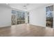 Bright bedroom with hardwood floors and large windows showcasing scenic views at 196 Mountaintop Cir, Pittsboro, NC 27312