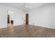 Clean bedroom with hardwood floors, ensuite bathroom and walk-in closet access at 196 Mountaintop Cir, Pittsboro, NC 27312