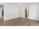 Neutral bedroom featuring wood floors and white walls at 196 Mountaintop Cir, Pittsboro, NC 27312