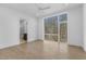 Bright bedroom featuring hardwood floors and large windows at 196 Mountaintop Cir, Pittsboro, NC 27312