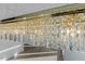 A stunning, modern rectangular chandelier features many crystals hanging down to illuminate the space with style and elegance at 196 Mountaintop Cir, Pittsboro, NC 27312
