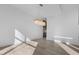 Bright dining area featuring hardwood floors and a modern chandelier at 196 Mountaintop Cir, Pittsboro, NC 27312