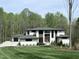Beautiful new construction home with a spacious yard, and wooded backdrop at 196 Mountaintop Cir, Pittsboro, NC 27312