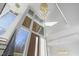 Stunning foyer with high ceilings and a contemporary chandelier at 196 Mountaintop Cir, Pittsboro, NC 27312