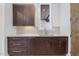 Contemporary kitchen with wooden cabinets, light countertops, and stainless steel sink at 196 Mountaintop Cir, Pittsboro, NC 27312