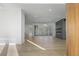 Bright living room featuring hardwood floors, a fireplace, and expansive windows with views at 196 Mountaintop Cir, Pittsboro, NC 27312