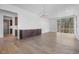 Living room with chandelier, modern cabinets with quartz counters and a view to the outside at 196 Mountaintop Cir, Pittsboro, NC 27312