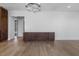 Living room with modern cabinets with quartz counters and view to the entryway at 196 Mountaintop Cir, Pittsboro, NC 27312