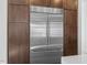 Stainless steel built-in refrigerator in modern kitchen at 196 Mountaintop Cir, Pittsboro, NC 27312