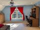 Upstairs bedroom with plenty of natural light, closet, and desk at 2012 Silverleaf Dr, Youngsville, NC 27596