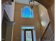 Grand foyer featuring high ceilings, a large window, and decorative lighting at 2012 Silverleaf Dr, Youngsville, NC 27596