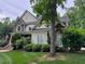Charming home featuring stone accents, a lush lawn, and inviting curb appeal in a desirable neighborhood at 2012 Silverleaf Dr, Youngsville, NC 27596