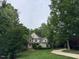 Charming two-story home with stone accents, landscaped yard and inviting curb appeal at 2012 Silverleaf Dr, Youngsville, NC 27596