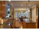 Eat-in kitchen features wooden cabinets, stainless steel appliances, and hardwood floors at 2012 Silverleaf Dr, Youngsville, NC 27596