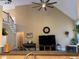 Open-concept living space with high ceilings and natural light, perfect for gathering and relaxing at 2012 Silverleaf Dr, Youngsville, NC 27596