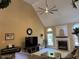 Bright living room with fireplace, high ceilings, and neutral decor at 2012 Silverleaf Dr, Youngsville, NC 27596